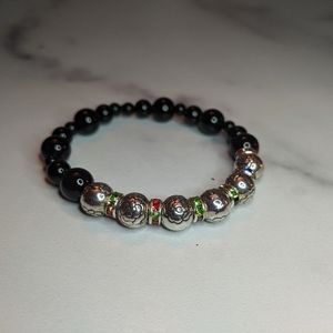 Handcrafted silver and black metal bracelet